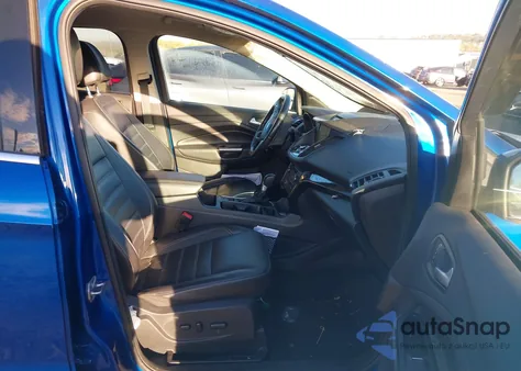 2017 Ford Escape Titanium z USA, uszkodzony, nr VIN 1FMCU9J91HUB57314